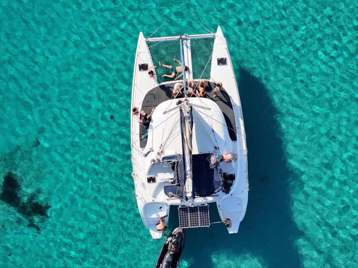 Private Catamaran Cruise Mykonos Delos with Meals & SUP - A Greek lunch served on deck