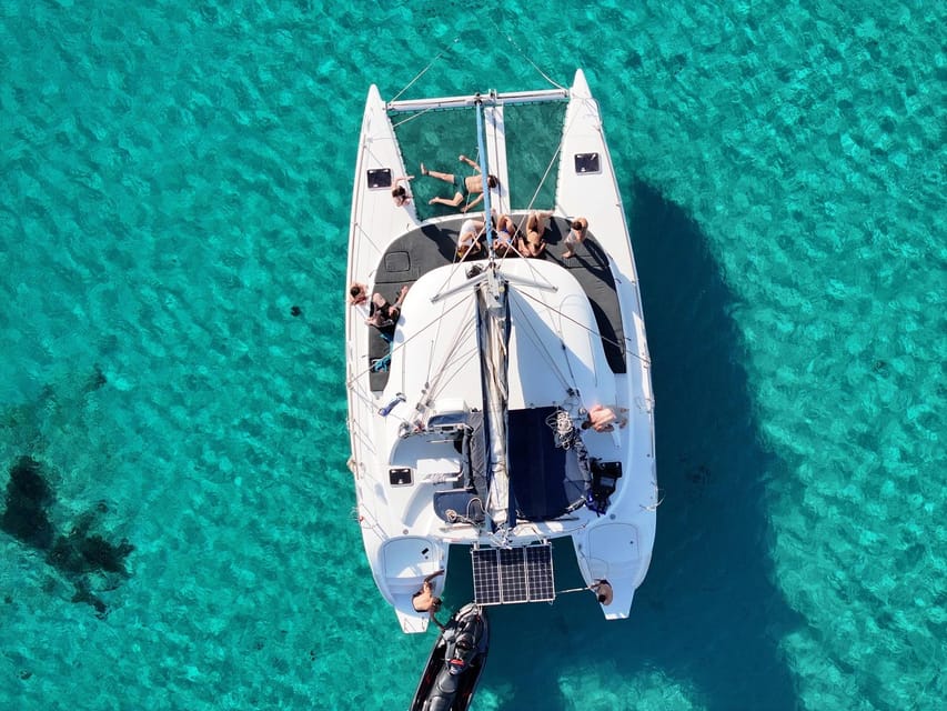 Private Catamaran Cruise Mykonos Delos with Meals & SUP - Captain Vasilis, Emil, and the private feel
