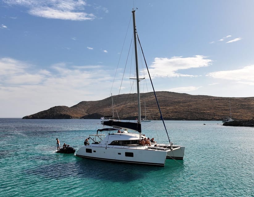 Private Catamaran Cruise Mykonos Delos with Meals & SUP - Rhenia’s coves and clear water