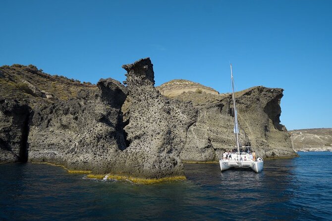 Private Luxury Santorini Catamaran Cruise with Port Pickup - Palea Kameni offers warm volcanic water