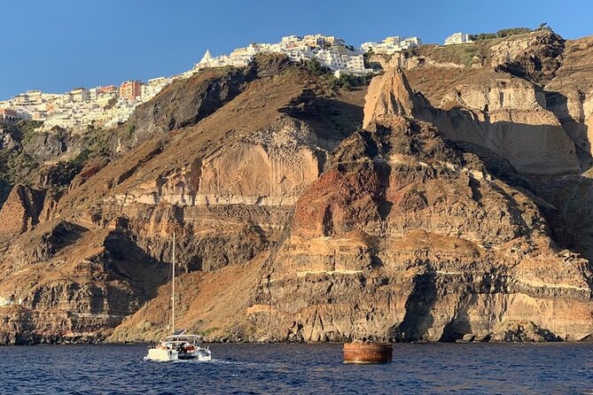 Private Luxury Santorini Catamaran Cruise with Port Pickup - Boat comfort and what to pack