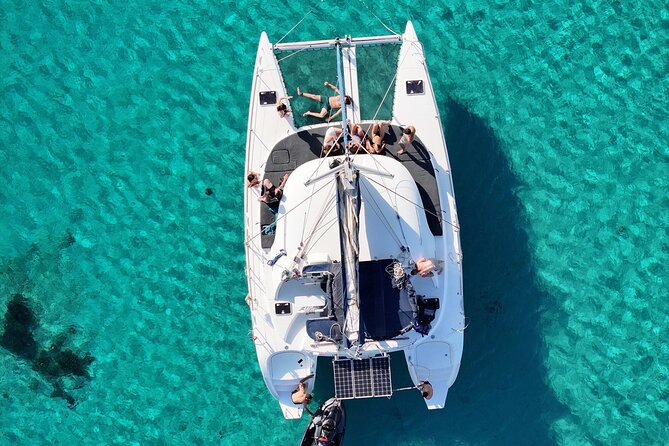Private Mykonos Catamaran Day Cruise with Meals & Water Toys - Rineia and the best water stops