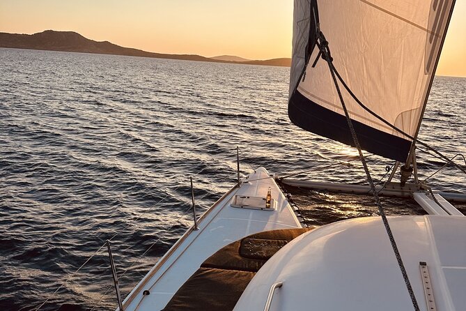 Private Mykonos Catamaran Day Cruise with Meals & Water Toys - Wind, safety, and cancellation concerns
