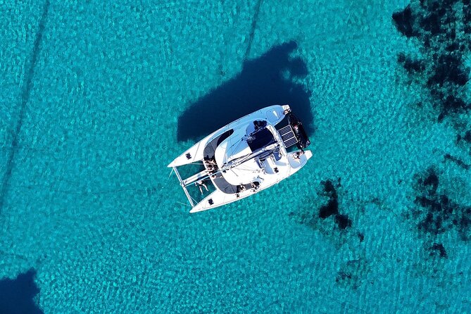 Private Mykonos Catamaran Day Cruise with Meals & Water Toys - Delos, the sightseeing stop