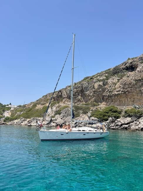Rhodes: Sunset Catamaran Cruise with Snack, Fruits & Drinks - The ride back and the sunset near Elli Beach