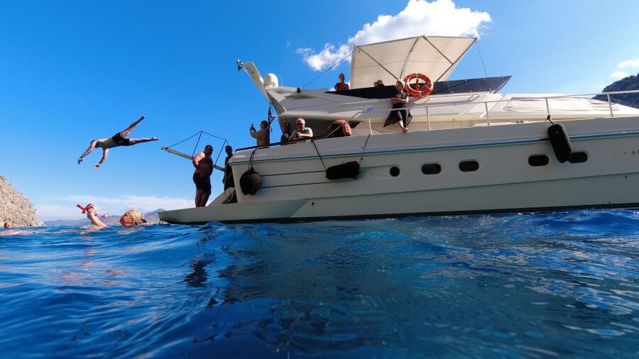 Rhodes: Symi Yacht Tour with Unlimited Drinks and Transfer - Lunch and swimming at St. George Bay