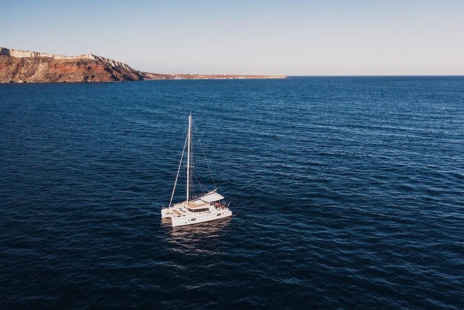 Romantic Sunset Catamaran Caldera Cruise incl. Meal & Drinks - The sunset near Oia is the payoff
