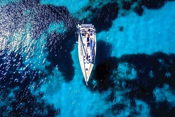 Sailsational Luxury Santorini Catamaran Sunset Cruise with Dinner - Red Beach from the water