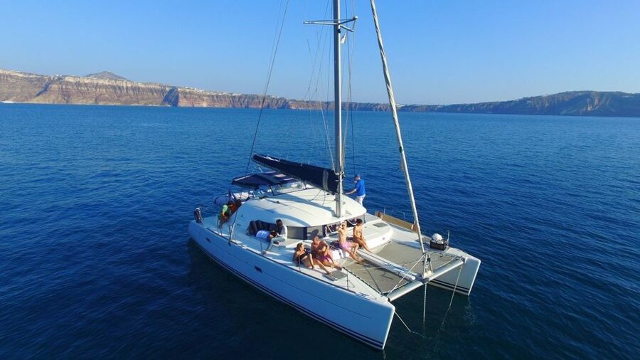 Santorini: 7-Hour Private Catamaran Cruise with Food & Drink - Mesa Pigadia and the sunset finish