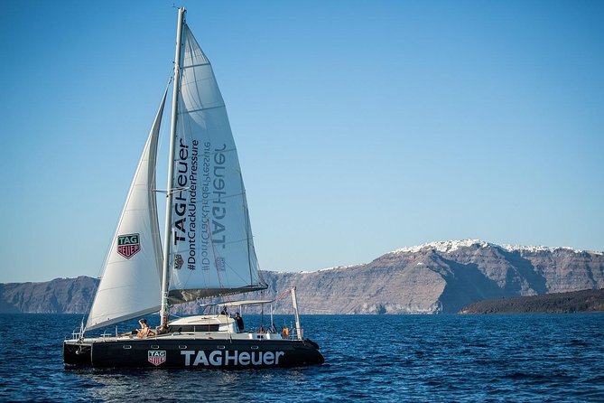 Santorini Adventurous Catamaran Experience with Snorkeling - BBQ lunch, wine, and the choice of sunset