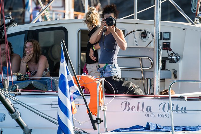 Santorini Adventurous Catamaran Experience with Snorkeling - Weather, cancellations, and practical timing