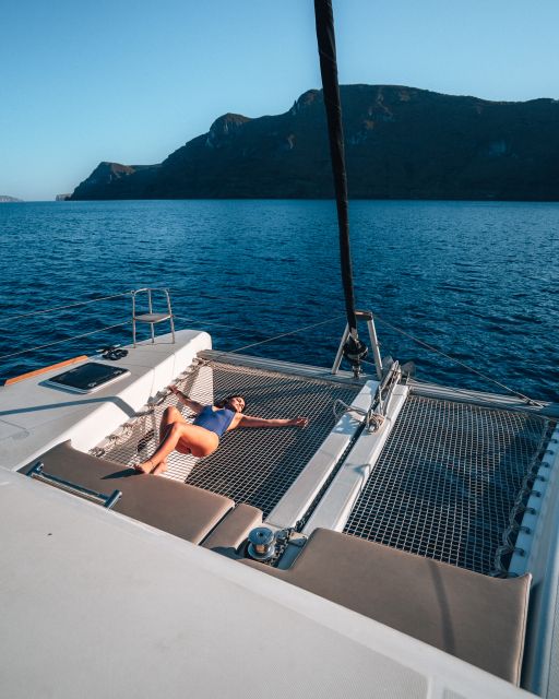 Santorini: All-Inclusive Private Catamaran Experience - Swimming at the Palea Kameni hot springs