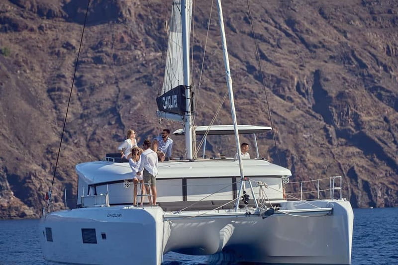 Santorini: Caldera Classic Catamaran Cruise w/ Meal & Drinks - Akrotiri Lighthouse and the Indian Face