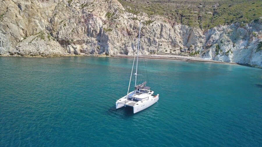 Santorini: Caldera Luxury Catamaran Cruise w/ Meal & Drinks - Mesa Pigadia and Santorini’s volcanic coast