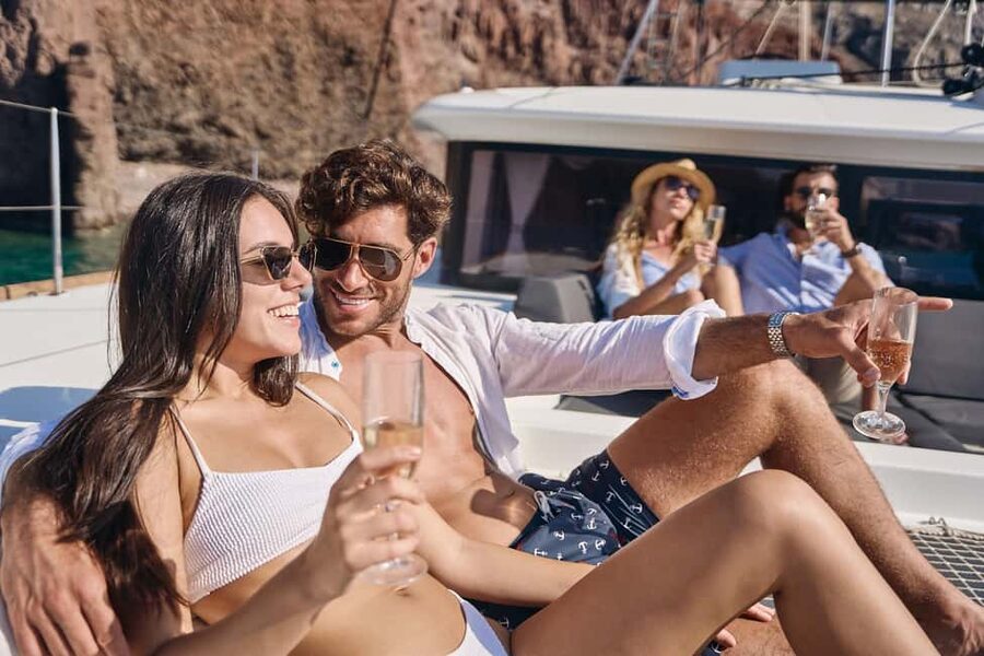 Santorini: Caldera Luxury Catamaran Cruise w/ Meal & Drinks - Red Beach and the cliffs of Akrotiri