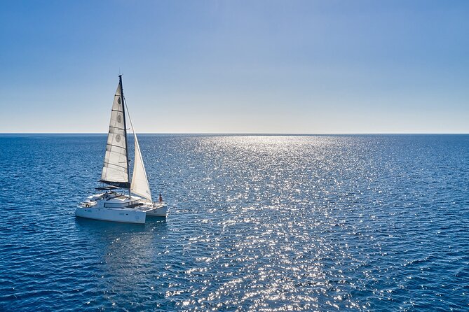 Santorini: Caldera Private Catamaran Cruise with Meal & Drinks - Daytime and sunset departures suit different plans