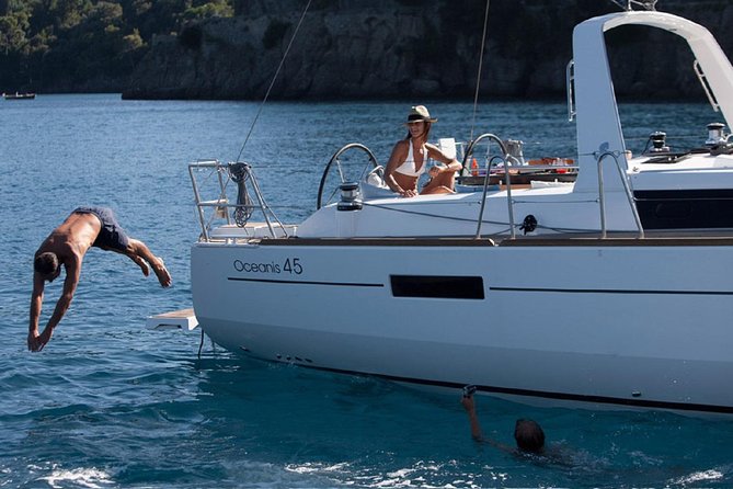 Santorini Caldera Private Sailing Boat Cruise - Swimming at the volcanic hot springs