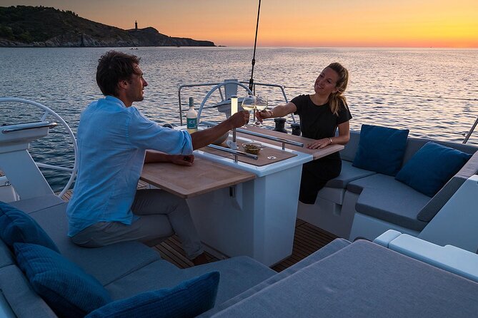 Santorini: Caldera Private Sailing Boat Cruise with Beneteau Oceanis 46.1 - Akrotiri Lighthouse and the volcanic coast