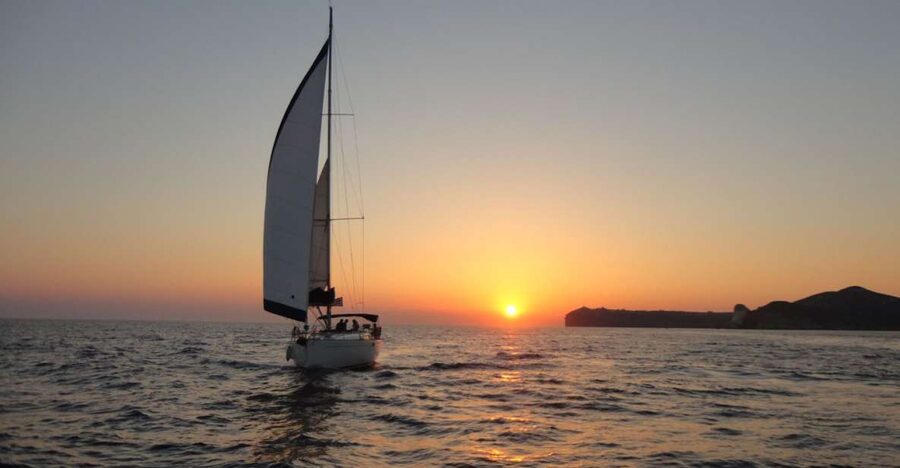 Santorini Caldera: Sunset Sailing Cruise with Meal - Swimming and snorkeling at Mesa Pigadia