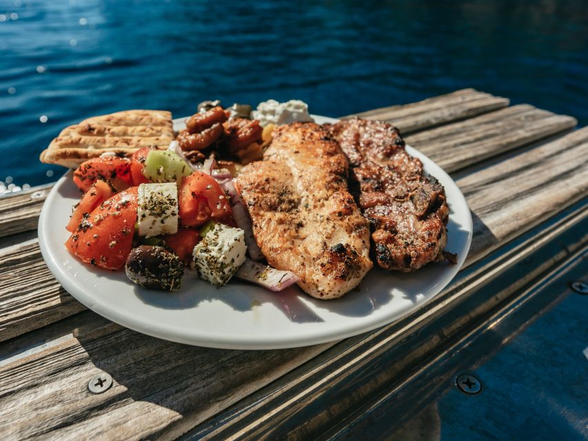 Santorini: Catamaran Caldera Cruise with Meal and Drinks - Leaving Ammoudi Bay or Vlychada Marina
