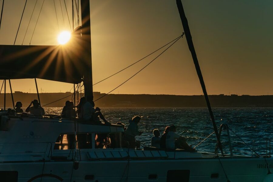 Santorini: Catamaran Caldera Cruise with Meal and Drinks - Sunset from the catamaran