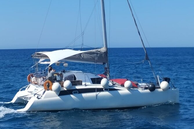 Santorini Catamaran Cruise – 5-Hour Private Sailing Experience - The lighthouse viewed from the water
