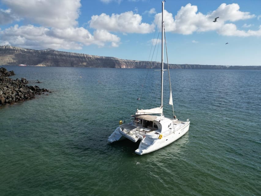 Santorini: Catamaran Cruise with Greek BBQ and Drinks - Why seeing Santorini from the water changes the day