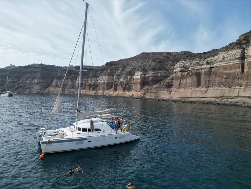 Santorini: Catamaran Cruise with Greek BBQ and Drinks - Boat size, comfort, and the social feel