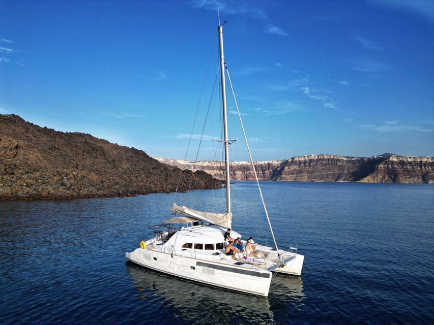 Santorini: Catamaran Cruise with Greek BBQ and Drinks - Boarding at Vlychada Marina