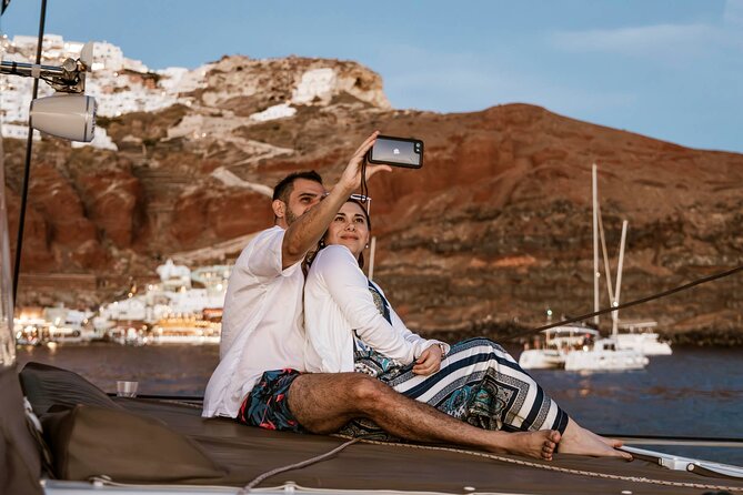 Santorini Catamaran Cruise with Greek Meal, Open-Bar and Sunset - Crew, comfort, and the shared-boat feel
