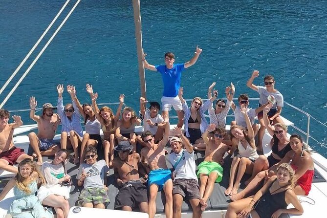 Santorini Catamaran Cruise with Meal and Drinks - Indian Rock, sea caves, and the old lighthouse