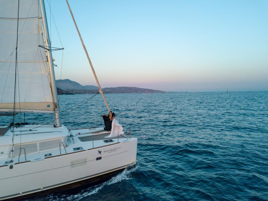 Santorini Catamaran Cruise with Swimming, Meal and Open Bar - Why a five-hour catamaran ride works well in Santorini