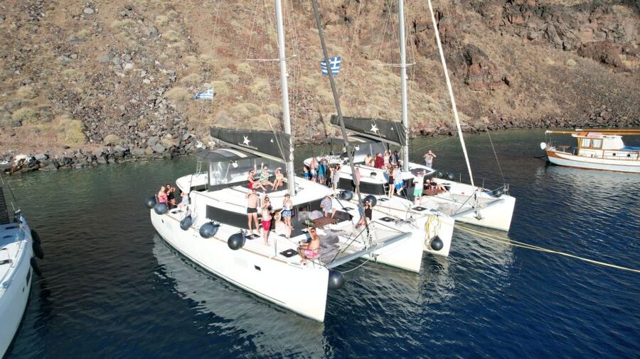 Santorini Catamaran Cruise with Swimming, Meal and Open Bar - Palea Kameni hot springs and the volcanic setting