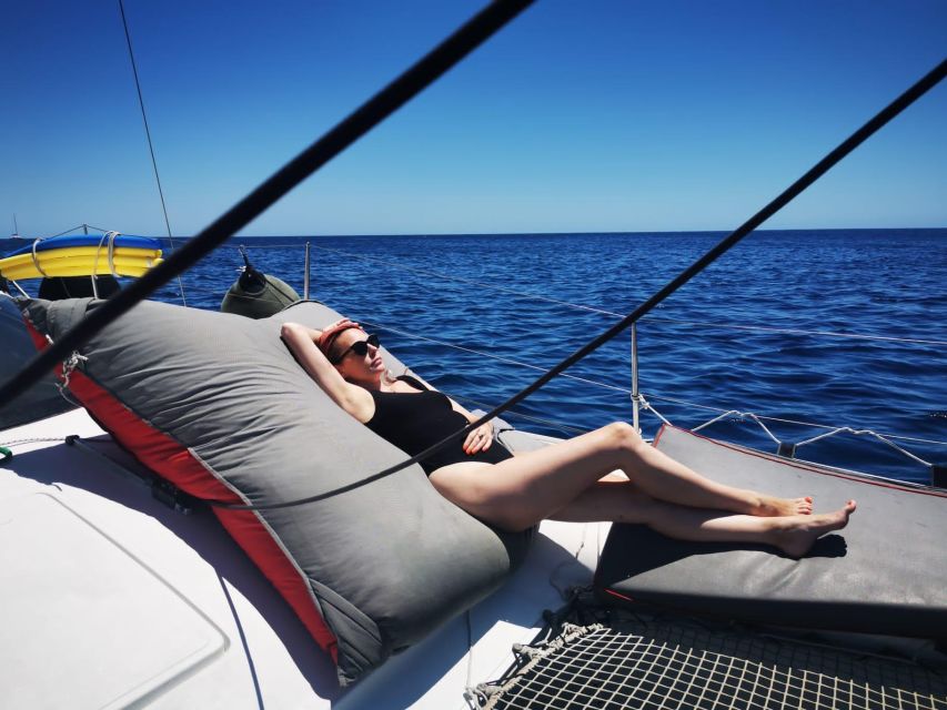 Santorini:Catamaran: private cruise with food & drinks - Why Santorini looks better from a catamaran