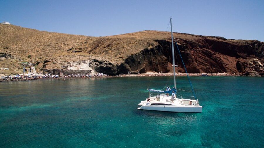 Santorini:Catamaran: private cruise with food & drinks - Leaving Vlychada for Red Beach