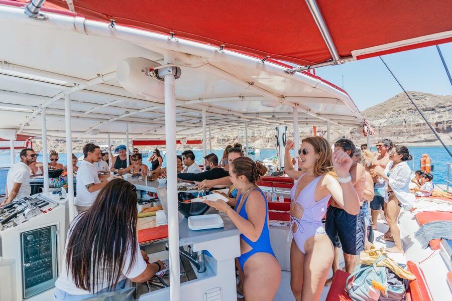 Santorini: Catamaran Tour with BBQ Dinner, Drinks, and Music - Who should book this Santorini catamaran cruise?