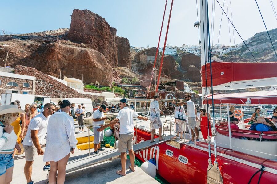 Santorini: Catamaran Tour with BBQ Dinner, Drinks, and Music - Pickup, boarding, and what to pack