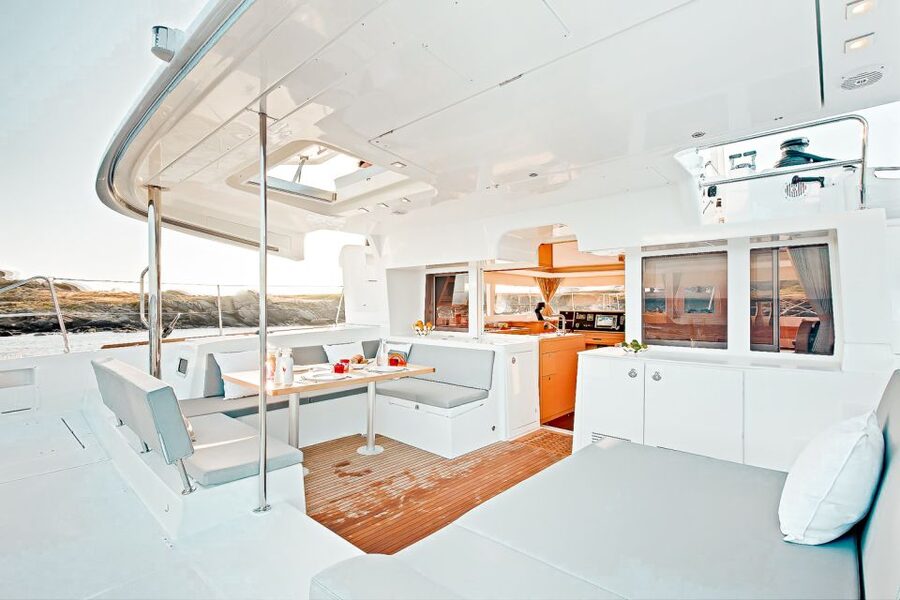 Santorini: Catamaran Tour with BBQ Meal and Unlimited Drinks - White Beach, lunch, and the value of staying aboard