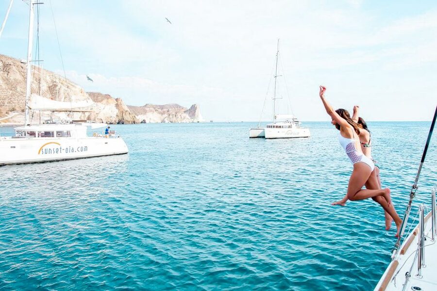 Santorini: Catamaran Tour with BBQ Meal and Unlimited Drinks - Red Beach and the second chance to swim