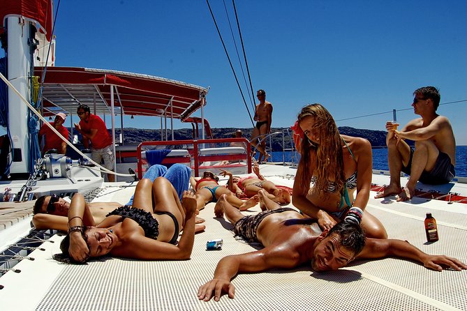 Santorini Cruise on Catamaran with BBQ & Open Bar - White Beach brings lunch and the longest stop