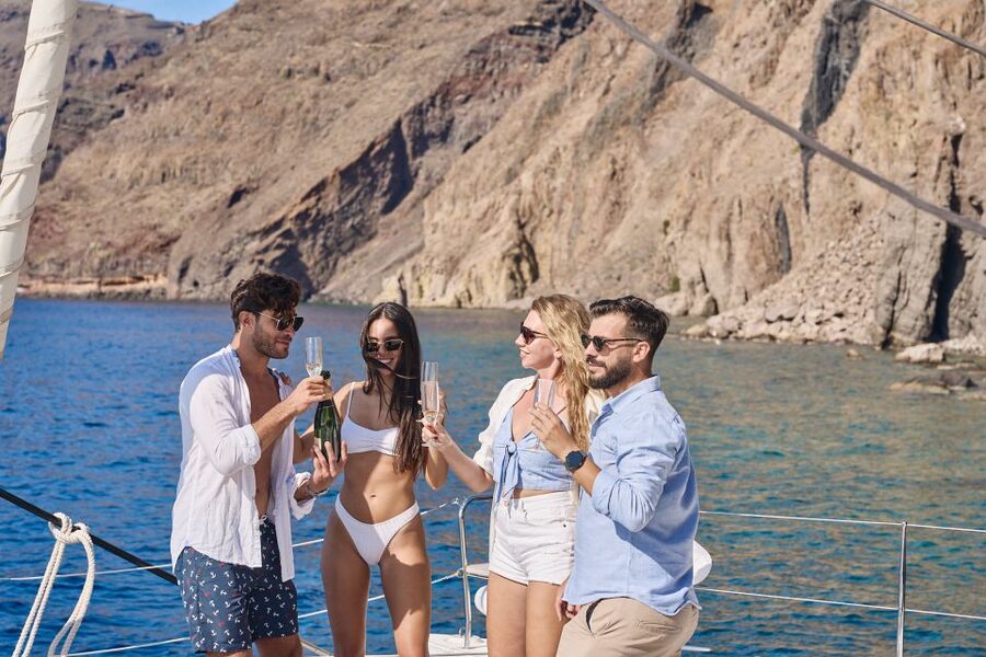 Santorini: Day Luxury Catamaran Cruise with Meal & Drinks - Smart packing for four hours at sea