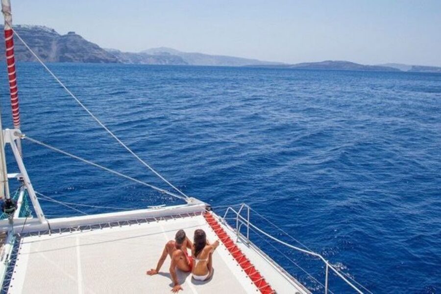 Santorini: Dream Catcher 5-hour Sailing Trip in the Caldera - Swimming and snorkeling in quiet bays