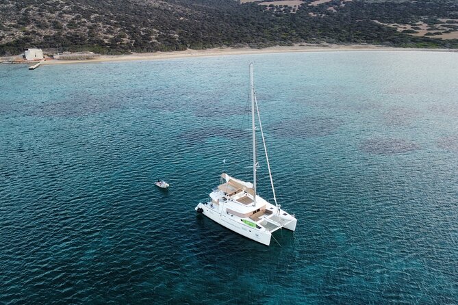 Santorini Gold Catamaran Cruise with BBQ, Drinks and Hotel Pickup - Day cruise or sunset cruise?