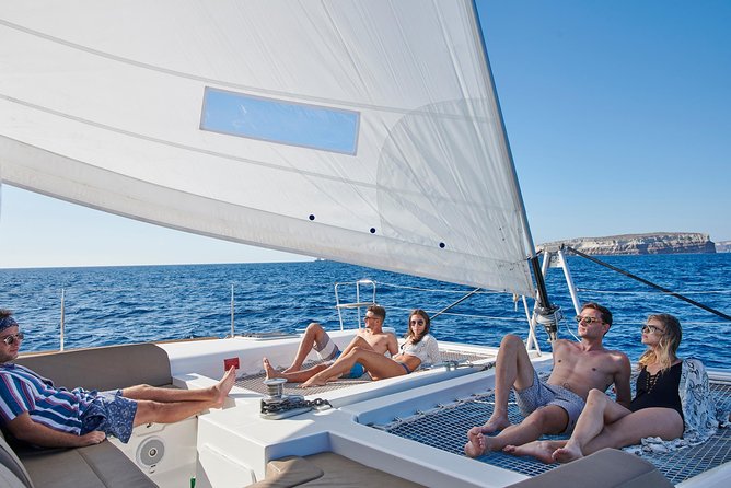 Santorini Gold Catamaran Cruise with BBQ, Drinks and Hotel Pickup - What the catamaran is like in real conditions