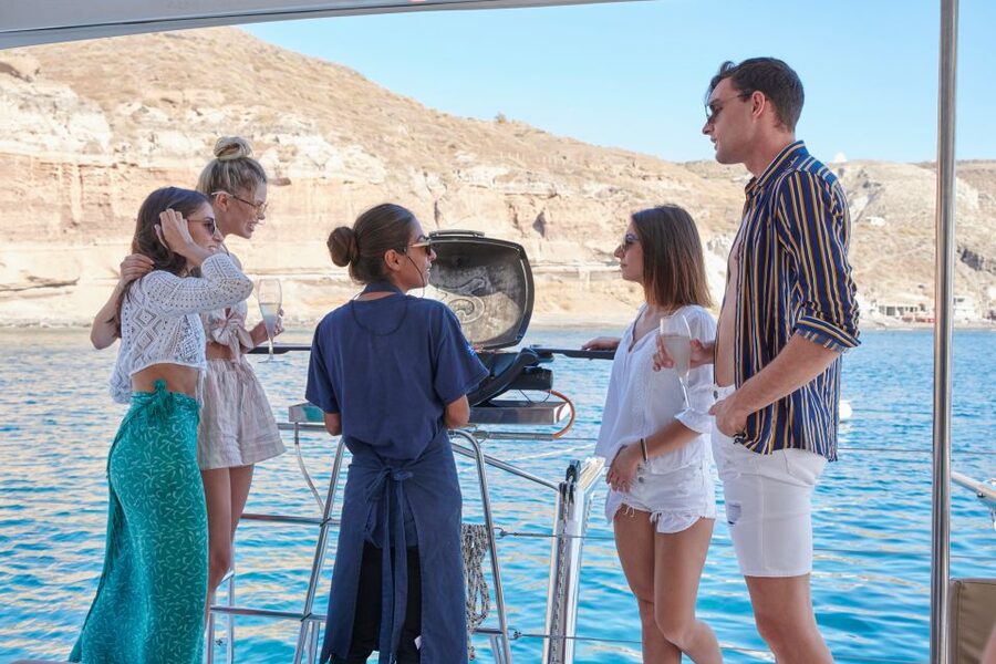 Santorini Gold Catamaran Cruise with Snorkel, BBQ & Open Bar - What the crew adds to the experience