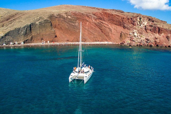 Santorini Half Day Catamaran Private Cruise incl. Meal, Drinks & Free Transport - Vlychada to Red Beach and White Beach