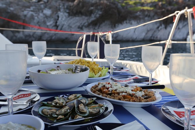 Santorini Half Day Catamaran Private Cruise incl. Meal, Drinks & Free Transport - Transfers, timing, and the details that matter