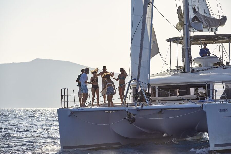 Santorini: Luxurious Catamaran Cruise with Meal & Open Bar - The real value of $153