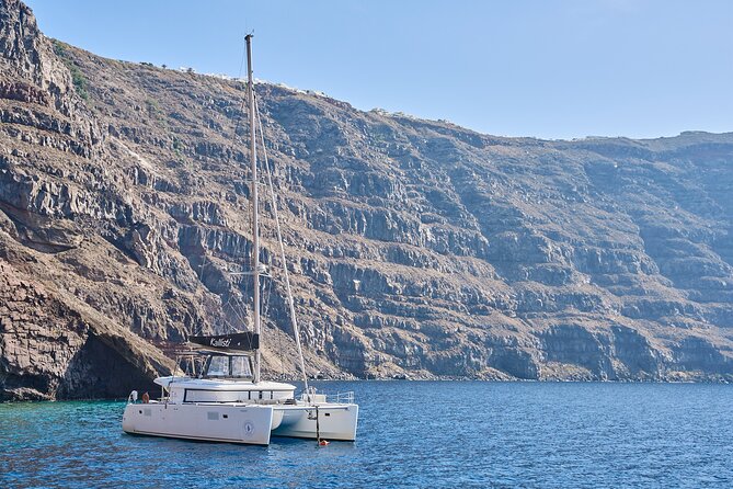 Santorini: Luxury Catamaran Cruise with Fresh Fish BBQ & Drinks - Why Santorini Looks Better From the Water