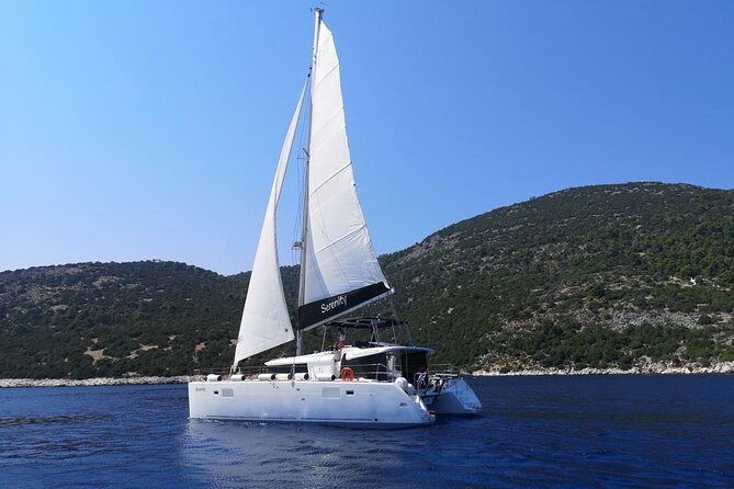 Santorini: Luxury Catamaran Cruise with Fresh Fish BBQ & Drinks - Nea Kameni, Sulfur Springs, and the Volcanic Center